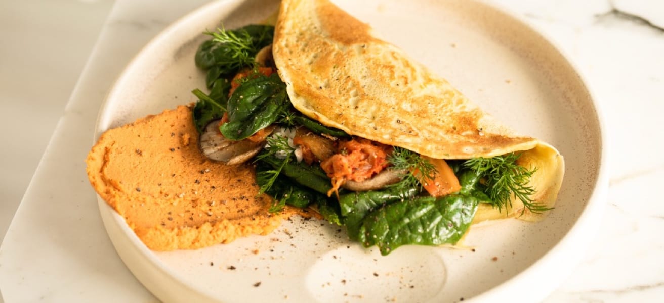 Plate of a simple omelette with vegetables